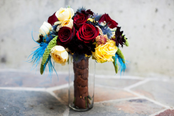 colorful wedding bouquet - A costume wedding with winged shoes, fist bumps, and an Indiana Jones groom colorful wedding bouquet