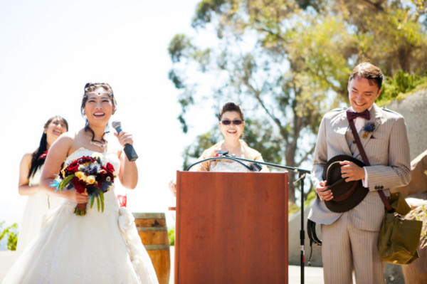 laughing vows1 - A costume wedding with winged shoes, fist bumps, and an Indiana Jones groom laughing vows1