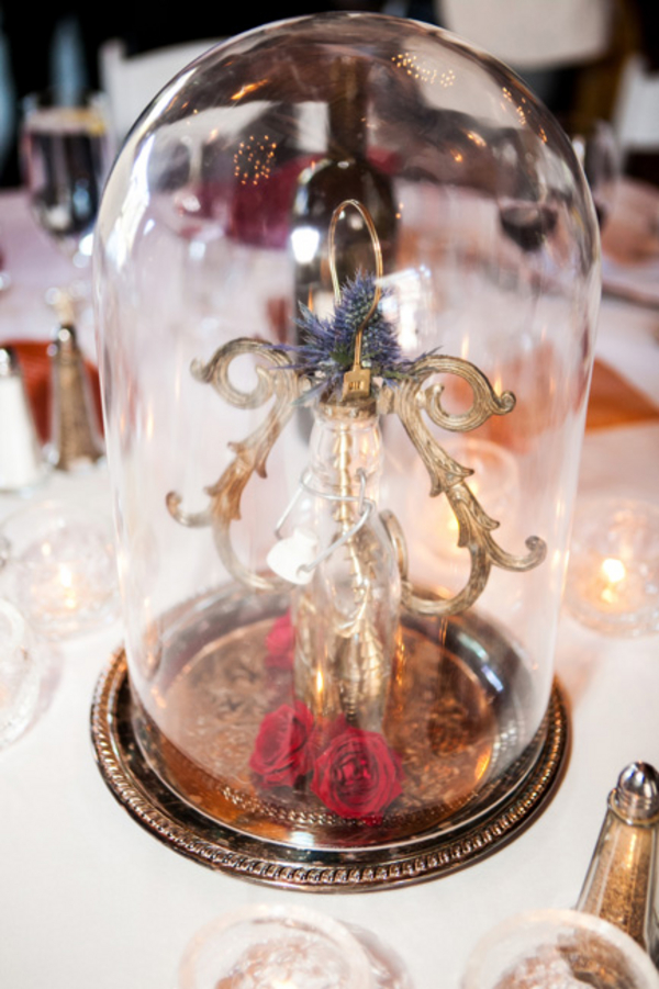 nerdy wedding centerpiece - A costume wedding with winged shoes, fist bumps, and an Indiana Jones groom nerdy wedding centerpiece