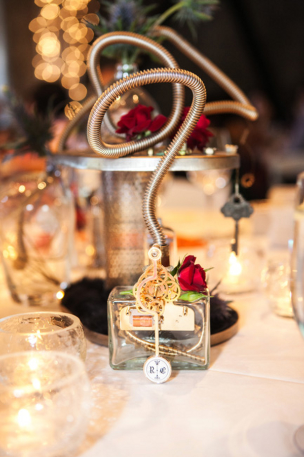 wedding centerpiece for nerds - A costume wedding with winged shoes, fist bumps, and an Indiana Jones groom wedding centerpiece for nerds