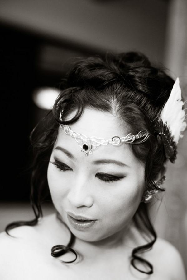 winged bridal head piece - A costume wedding with winged shoes, fist bumps, and an Indiana Jones groom winged bridal head piece