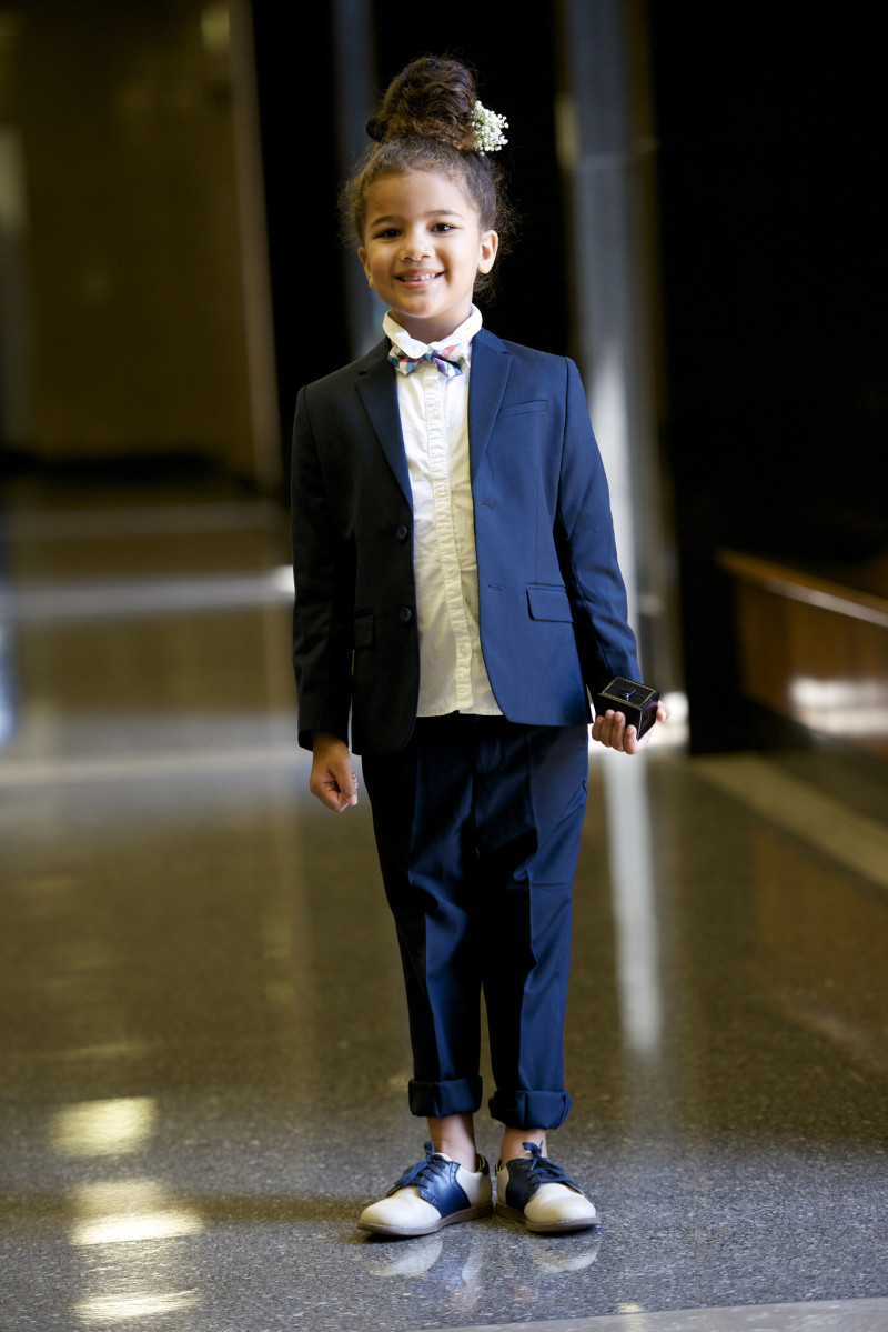 Cutest little female ring bearer in a suit on @offbeatbride