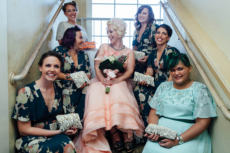 Flamingo-themed pool party wedding as seen on @offbeatbride