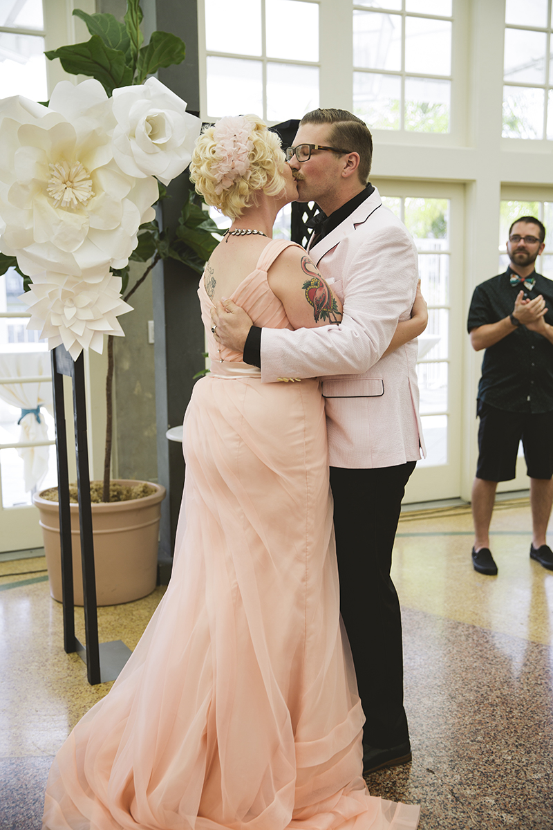Flamingo-themed pool party wedding as seen on @offbeatbride
