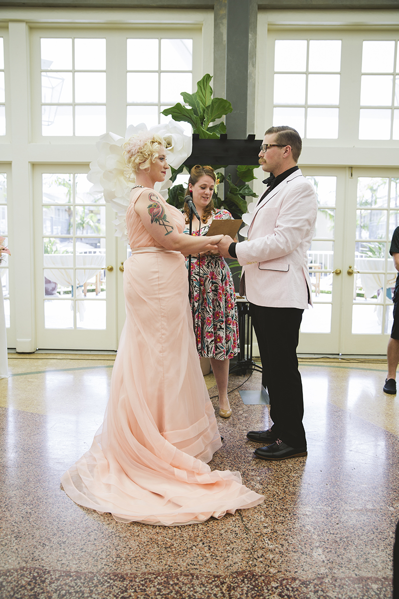 Flamingo-themed pool party wedding as seen on @offbeatbride