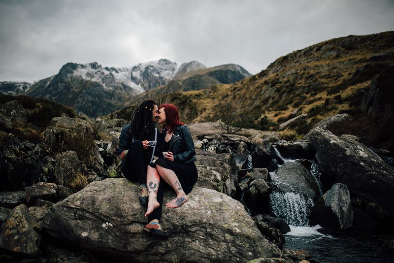 Topless engagement photos on a cold mountain in Wales as seen on @offbeatbride