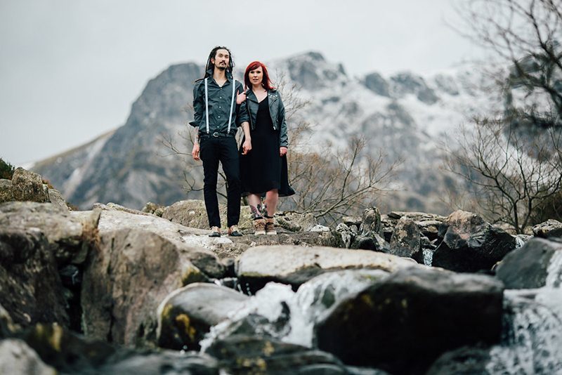 Topless engagement photos on a cold mountain in Wales as seen on @offbeatbride