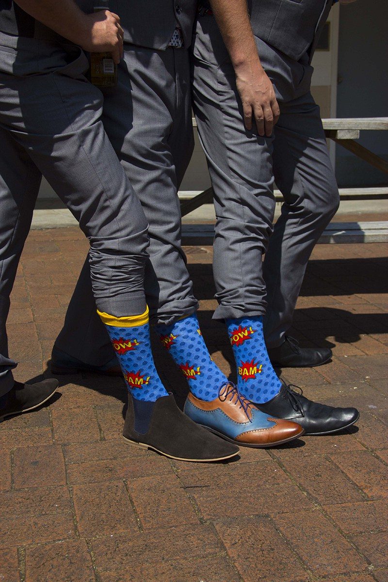 The groomsmen can rock "getting ready" shots, too!