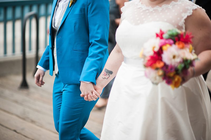 Balloons and make-outs at this carnival leap year wedding