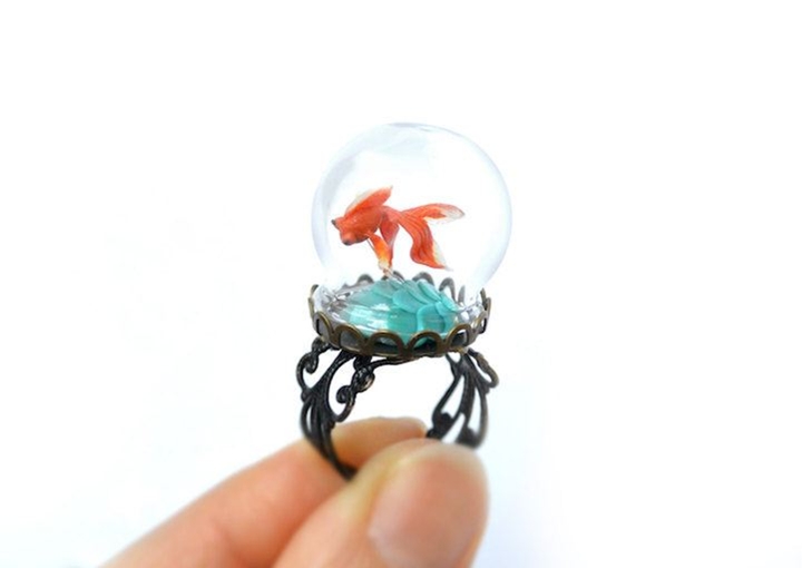 These wooden rings contain whole tiny worlds!