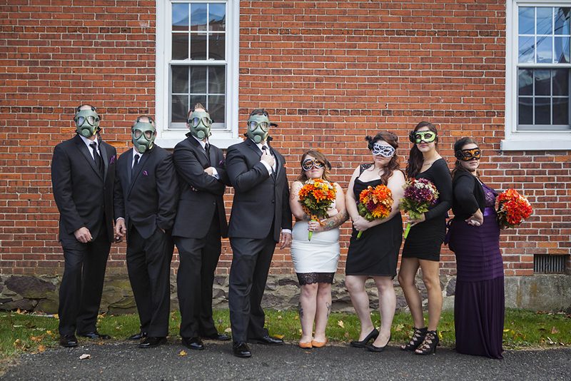A gas mask-erade wedding fit for the impending zombie apocalypse