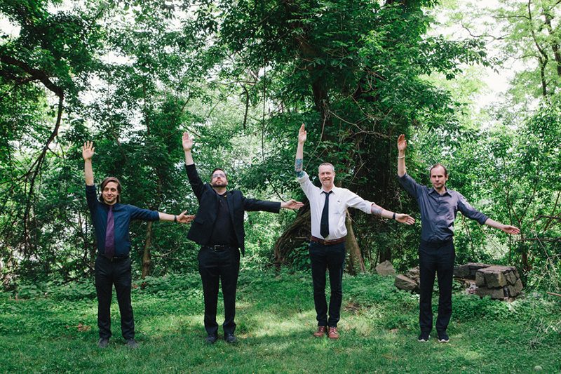 A Muppet officiated this cliffside New York wedding with a killer black dress