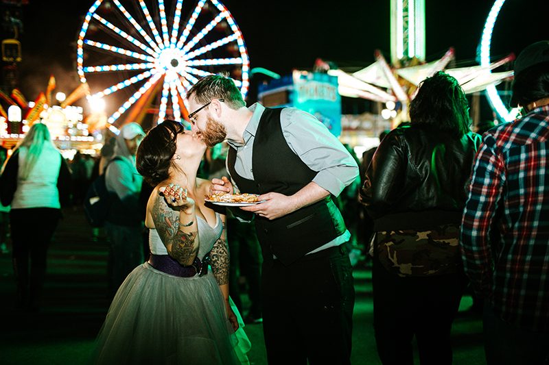 Have a bite of "first funnel cake" at this North Carolina state fair wedding