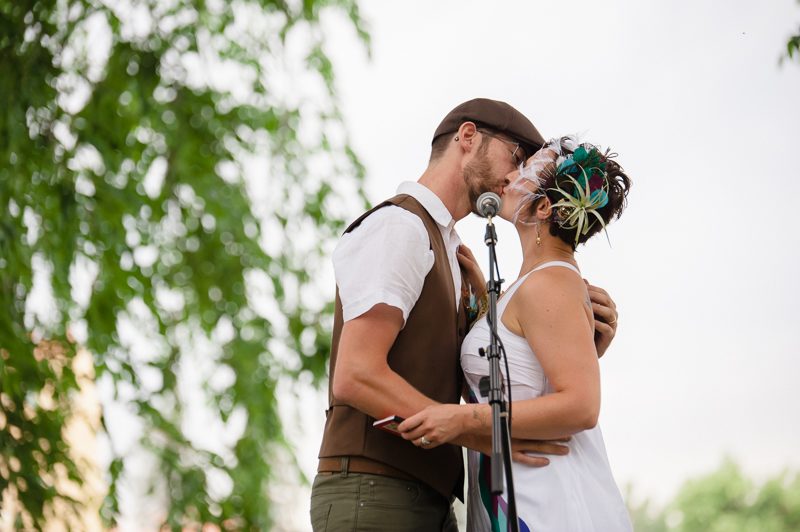 Be wowed by this eccentric Denver wedding with costumes, singing, and a "first lap"
