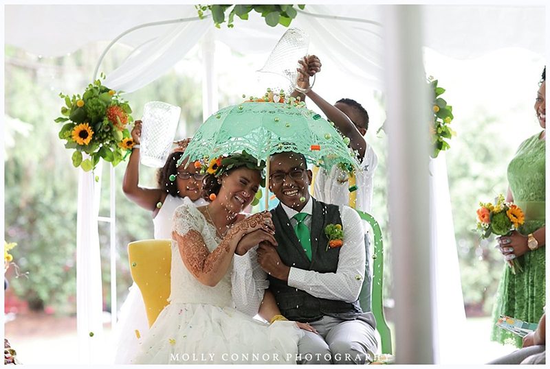 Rain falls like love at this "mutual weirdness" citrus colored wedding