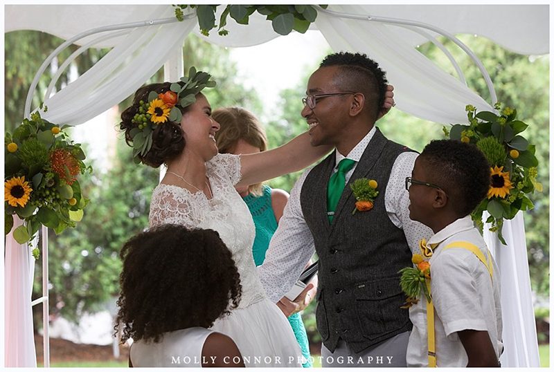 Rain falls like love at this "mutual weirdness" bright colored wedding