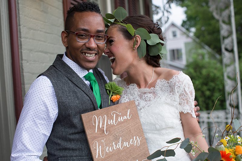 Rain falls like love at this "mutual weirdness" bright colored wedding