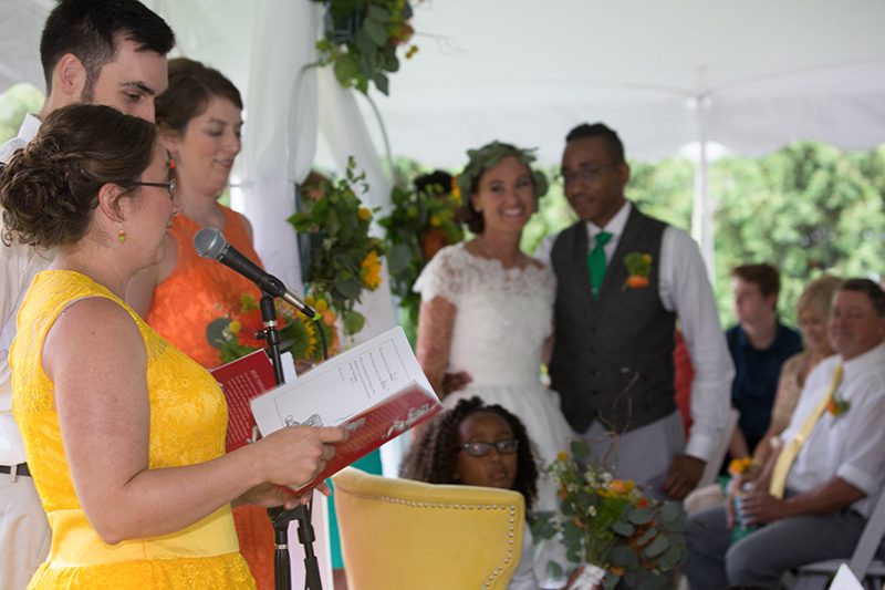 Rain falls like love at this "mutual weirdness" bright colored wedding