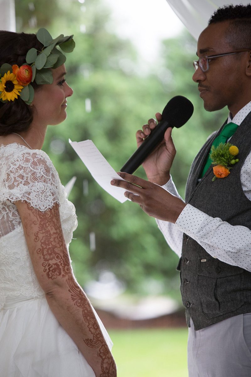 Rain falls like love at this "mutual weirdness" citrus colored wedding