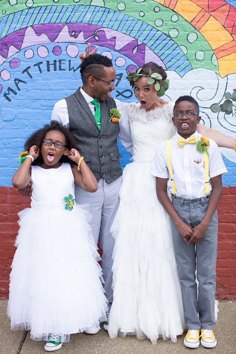 Rain falls like love at this "mutual weirdness" bright colored wedding