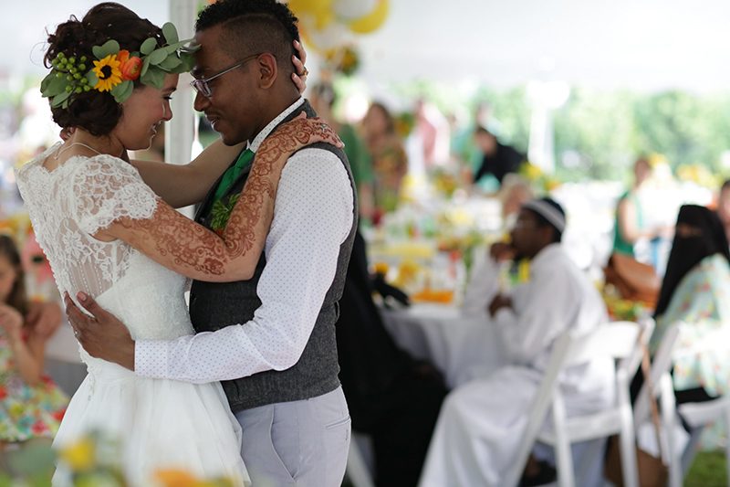 Rain falls like love at this "mutual weirdness" bright colored wedding