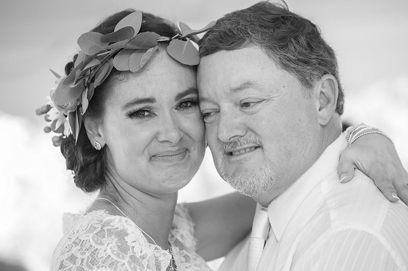 Rain falls like love at this "mutual weirdness" bright colored wedding