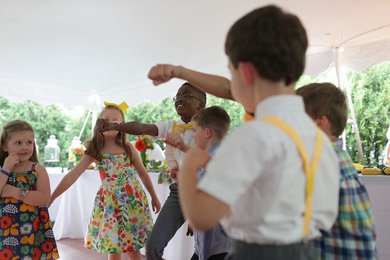 Rain falls like love at this "mutual weirdness" bright colored wedding