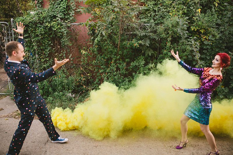 Cotton candy, smoke bombs, and LED outfits shine at this wonderfully weird Austin wedding
