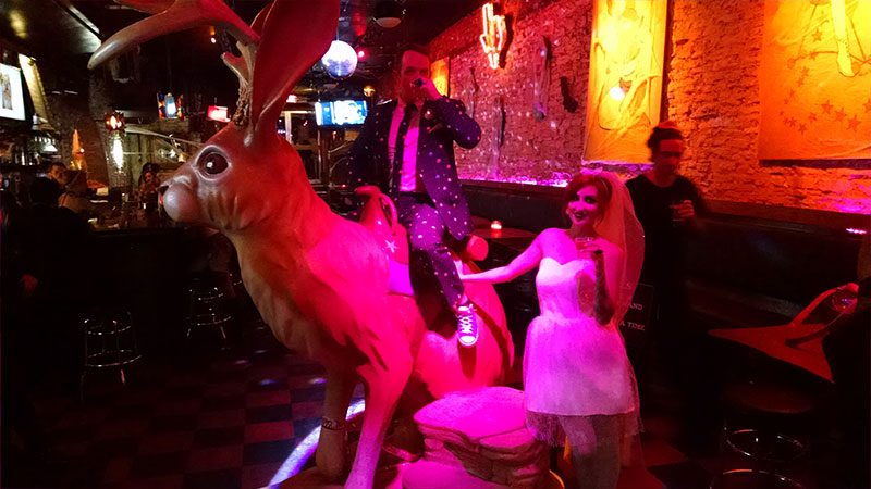 Cotton candy, smoke bombs, and LED outfits shine at this wonderfully weird Austin wedding