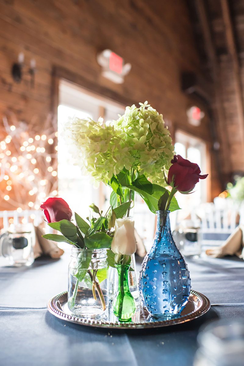 We heart the pink dress and hanky bags at this barn wedding