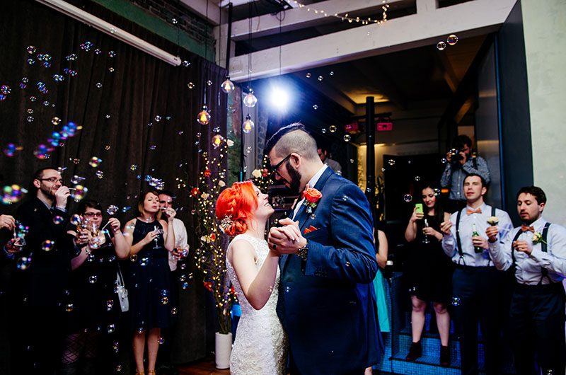 Epic battles and rainbow bubbles at this space wedding