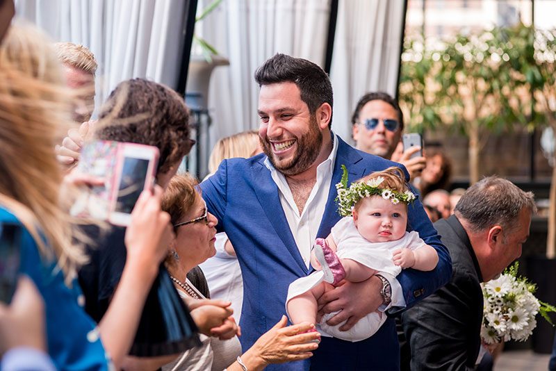 This NYC wedding (with breastfeeding, yoga, and a very familiar cake creator!) was planned in only TWO WEEKS