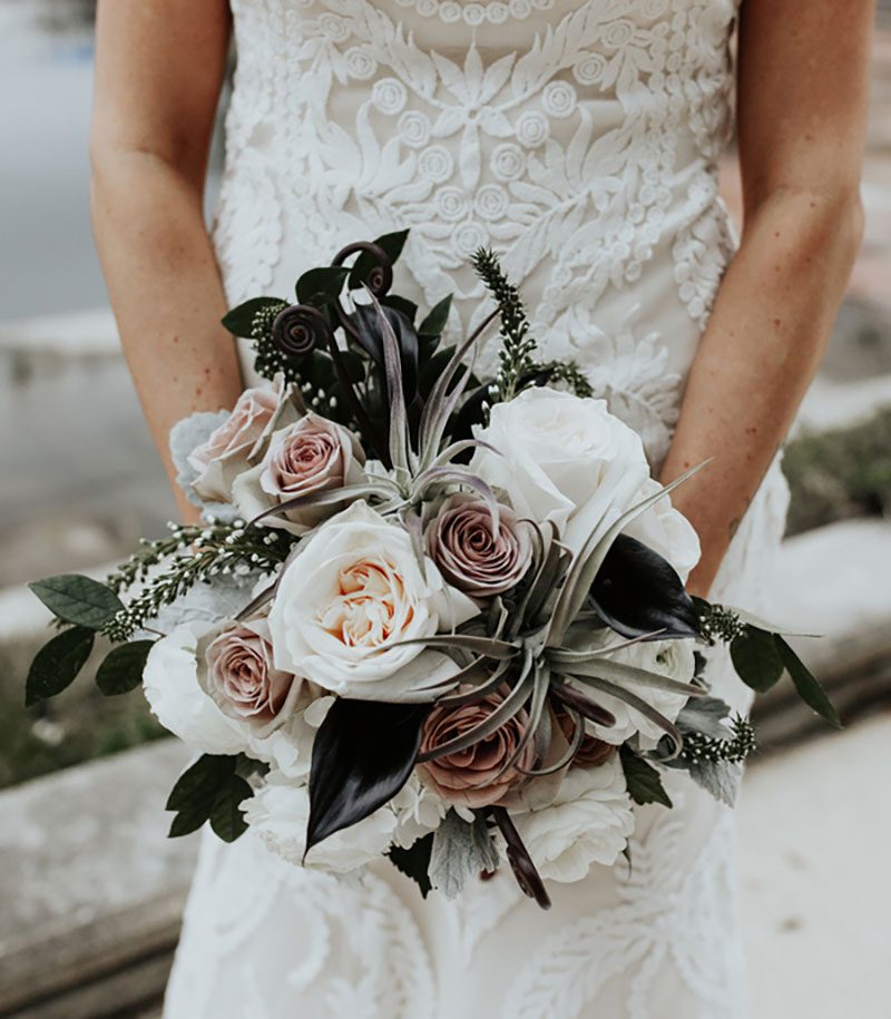 Pine cones, flowery hair, and forest chic combine at this rustic mountain wedding