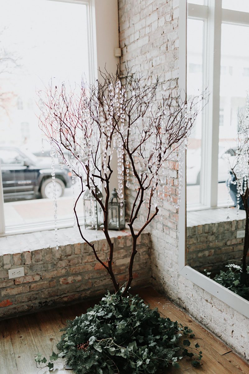 Pine cones, flowery hair, and forest chic combine at this rustic wedding