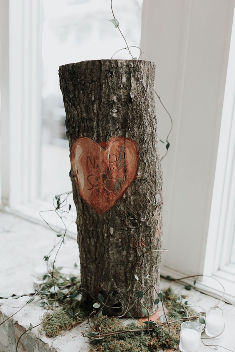 Pine cones, flowery hair, and forest chic combine at this rustic wedding