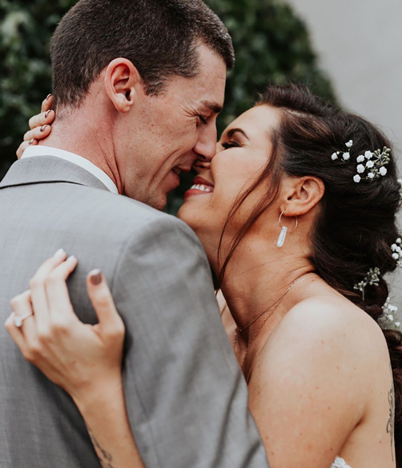 Pine cones, flowery hair, and forest chic combine at this rustic mountain wedding