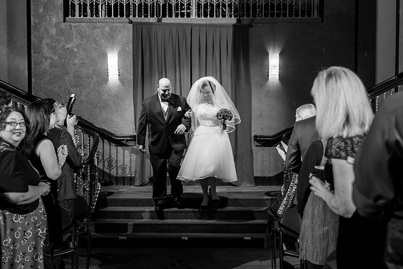 This wedding is like if David Lynch filmed The Addams Family ballroom scene