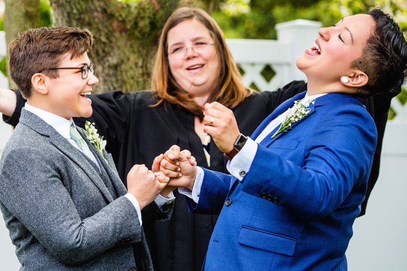 These brides triumphed with killer suits at their house on the shore