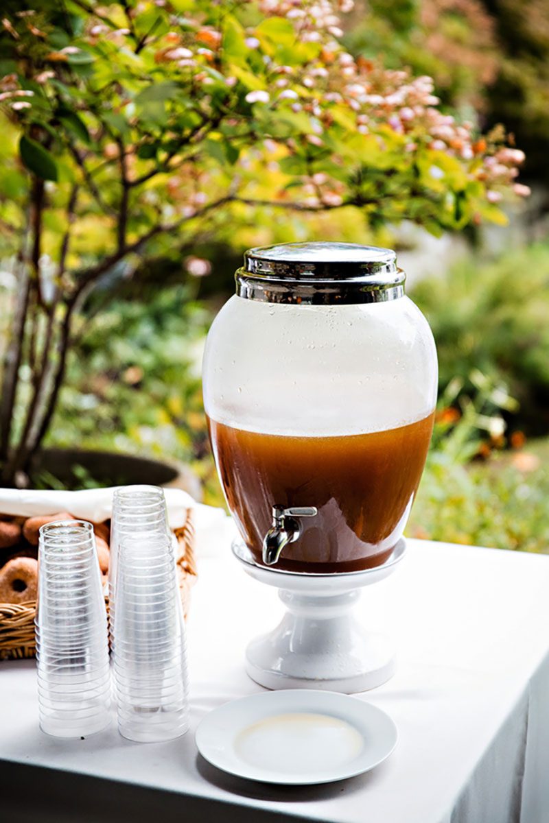 Intimate, rustic DIY fall wedding celebration with red-dressed bride