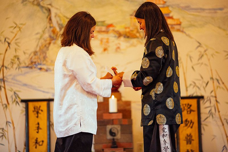 Two girls in gis: a dojo martial arts wedding (with a martial arts ceremony!)