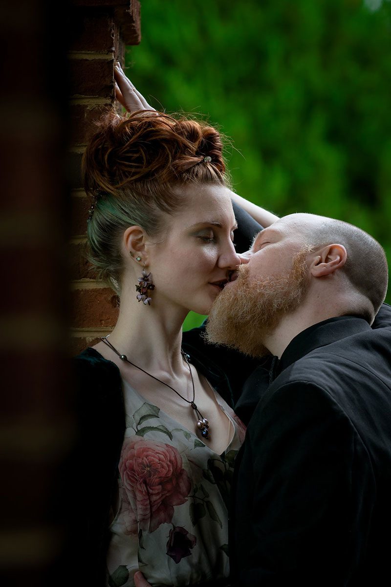 A masked engagement story in the rain