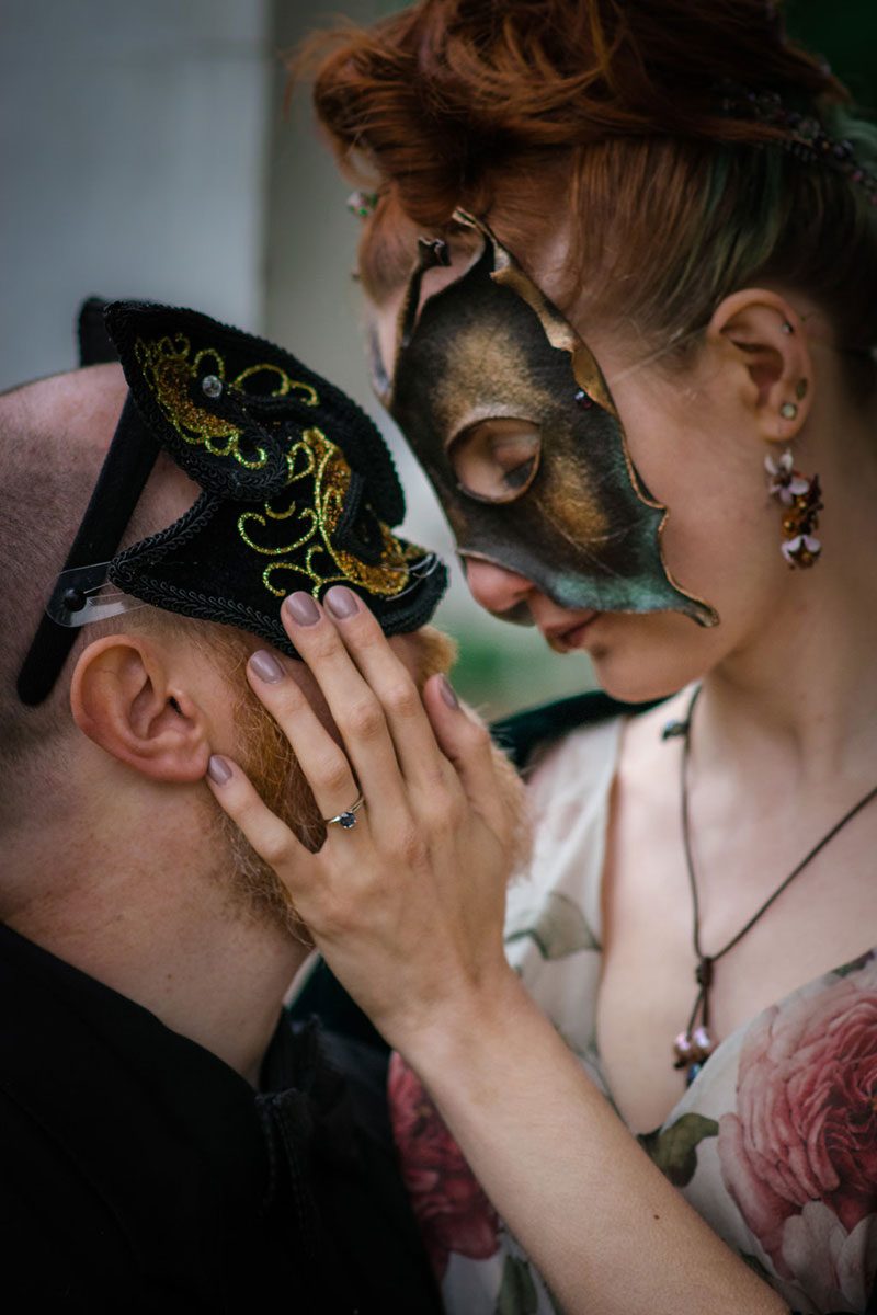 A masked engagement story in the rain