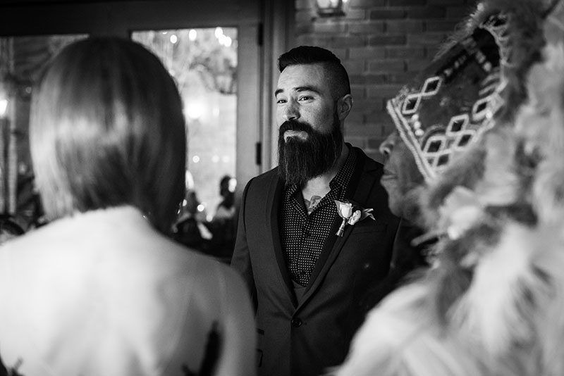 A glam Halloween wedding with a black dress and beignets