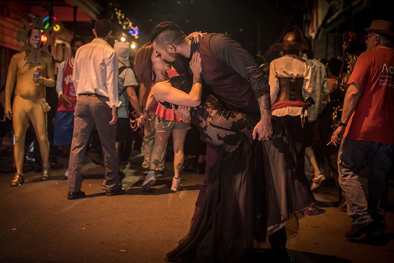 A glam Halloween wedding with a black dress and beignets