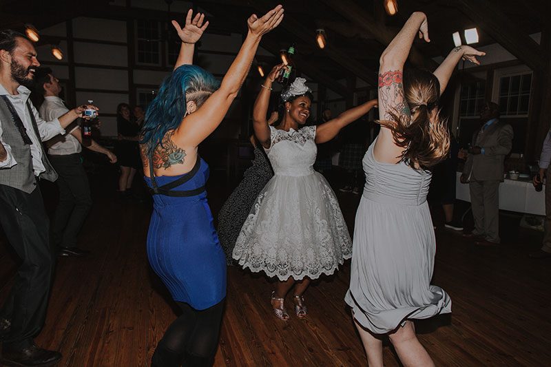 Pink hair + rainbows abound at this vividly geeky wedding