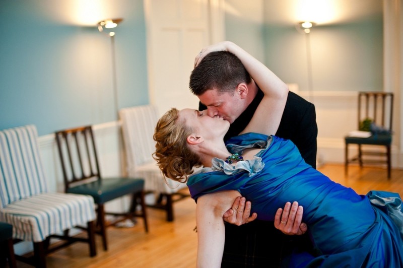 A Scotland wedding with an electric blue gown and a sword fight