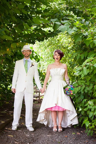 Spring & Alex’s colorful lawn games and giant pillows wedding