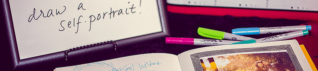 Ditch the photo guest book and ask your artistic guests to draw self-portraits