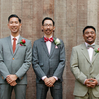 A dapper as hell groom and his super chic posse