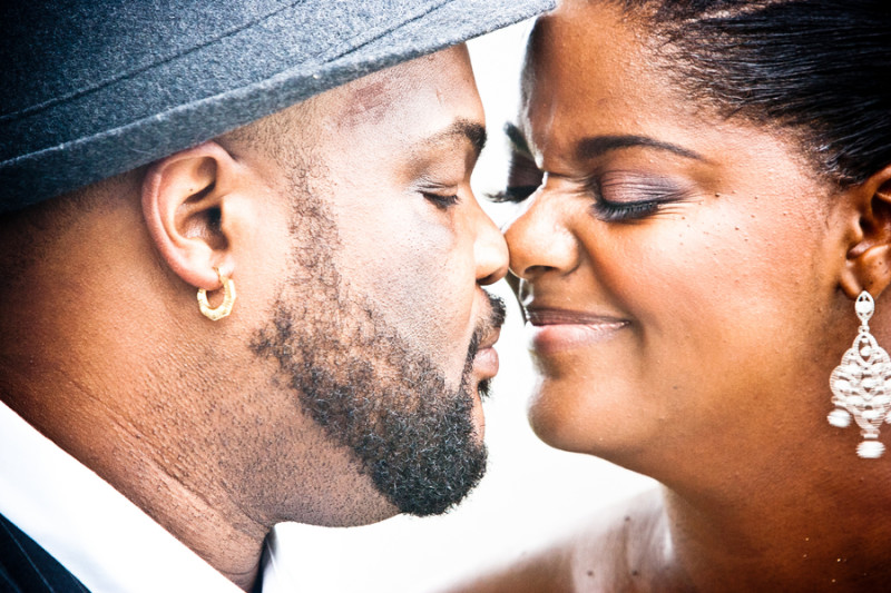 Sweet kisses and a tearful groom at this sunset Florida beach wedding